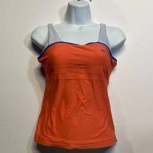 Nike woman’s yoga athletic orange/blue built-in bra. Size XS